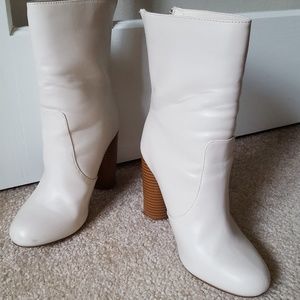 Cream high healed boots